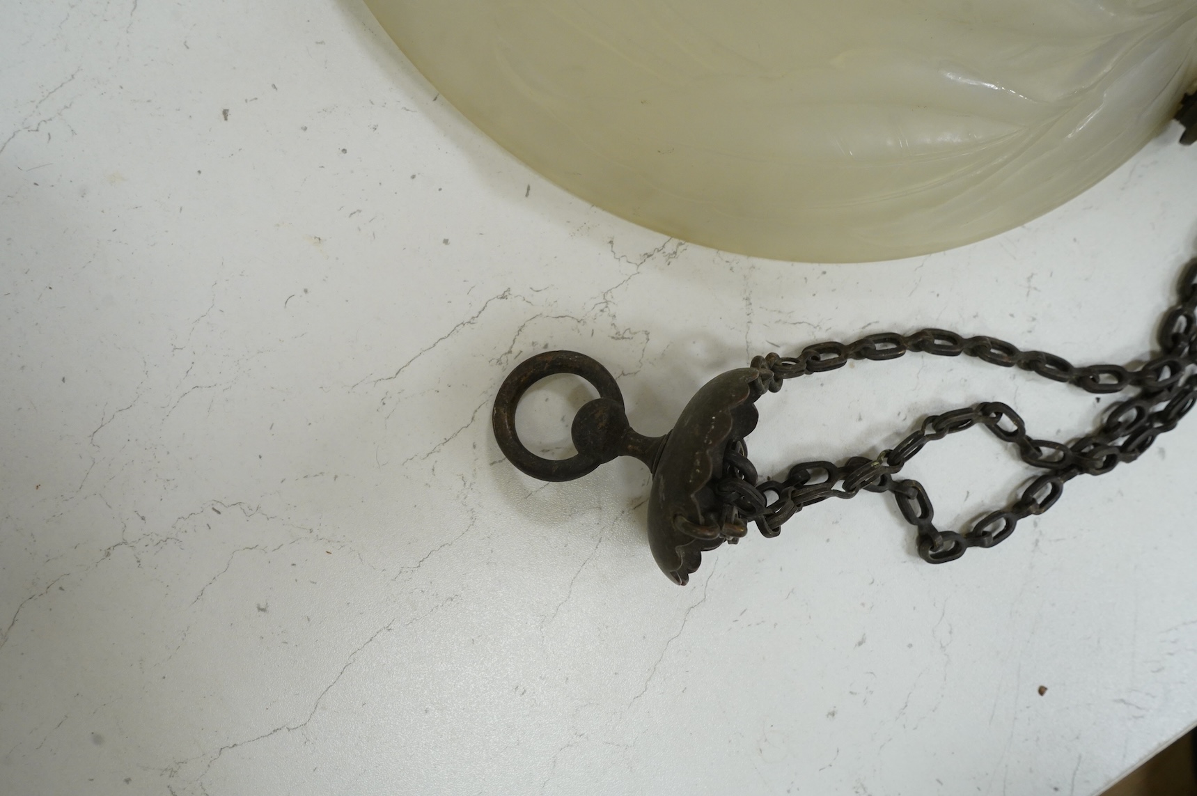 A Lalique style opalescent glass ceiling shade decorated with three sunflowers, 34cm in diameter
